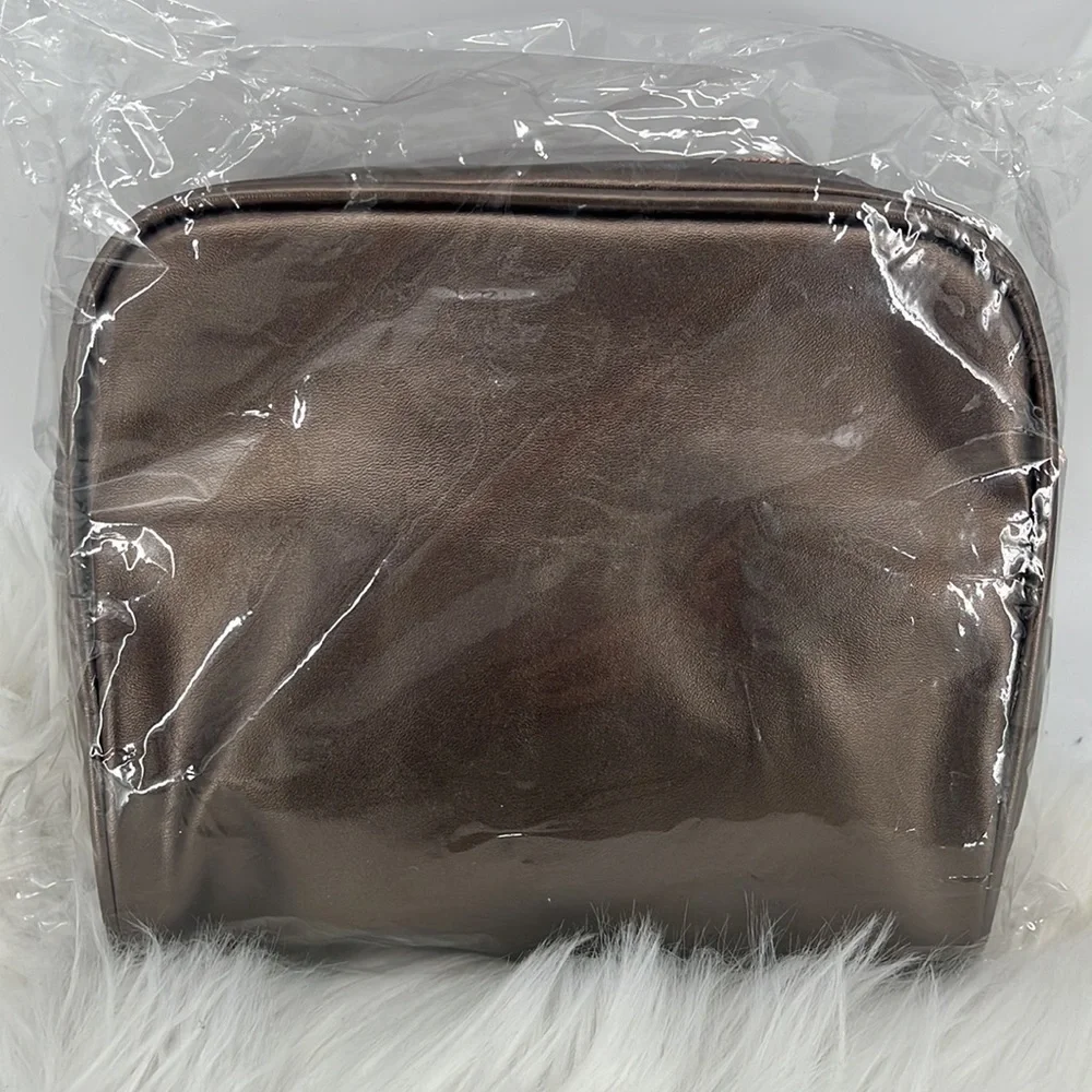 Sienna Mae Bronze Cosmetic Bag with Tassel New with tags!!